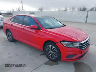2019 Volkswagen Jetta S z VIN 3VWC57BUXKM099060, wystawiony jako IAAI lot #41478697 z przebiegiem 134 363 mil mil oraz . Historia ofert i sprzedaży dostępna na DreamBid. Obrazek 1.