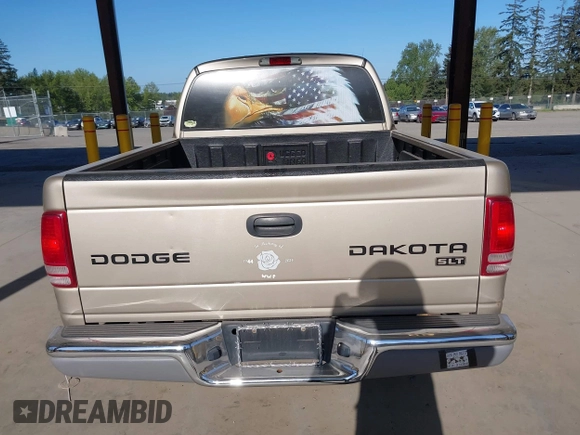 2003 Dodge Dakota SLT with VIN 1D7HG48N03S344321, listed as a IAAI auction lot 42074421 with 96,489 mi miles and . Bid and sale history available at DreamBid. Image 16.