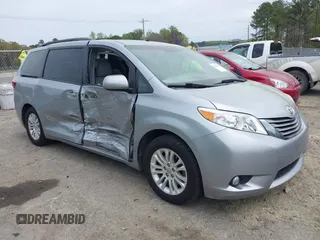 2016 Toyota Sienna XLE with VIN 5TDYK3DC5GS707637, listed as a IAAI auction lot 41929947 with 98,714 mi miles and . Bid and sale history available at DreamBid. Image 1.