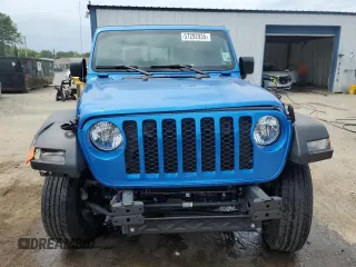 2023 Jeep Gladiator Sport S with VIN 1C6HJTAG3PL593284, listed as a Copart auction lot 57292935 with Not provided miles and Salvage title. Bid and sale history available at DreamBid. Image 5.