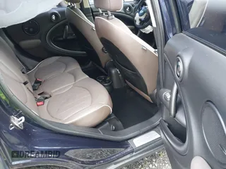 2015 MINI Countryman S z VIN WMWZC3C57FWT06297, wystawiony jako IAAI lot #41988157 z przebiegiem 74 461 mil mil oraz . Historia ofert i sprzedaży dostępna na DreamBid. Obrazek 8.