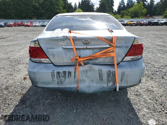 2005 Toyota Camry LE with VIN 4T1BE30K35U603940, listed as a Copart auction lot 61404235 with 203,294 mi miles and Salvage title. Bid and sale history available at DreamBid. Image 6.