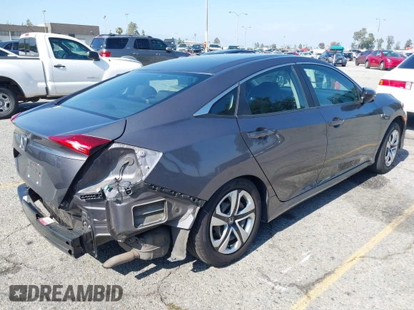2018 Honda Civic LX with VIN 2HGFC2F53JH501754, listed as a IAAI auction lot 42203836 with 107,910 mi miles and . Bid and sale history available at DreamBid. Image 4.