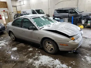 2001 Saturn SL with VIN 1G8ZK54791Z298951, listed as a Copart auction lot 89198795 with 157,208 mi miles and Salvage title. Bid and sale history available at DreamBid. Image 4.