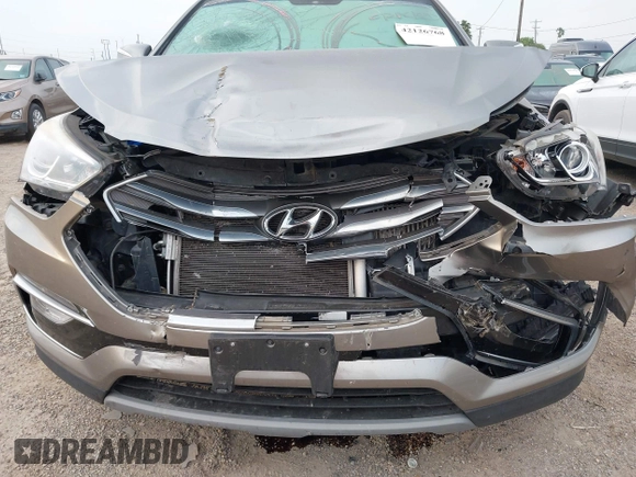 2018 Hyundai Santa Fe Ultimate with VIN 5NMZWDLAXJH100108, listed as a IAAI auction lot 42126768 with 68,325 mi miles and . Bid and sale history available at DreamBid. Image 6.