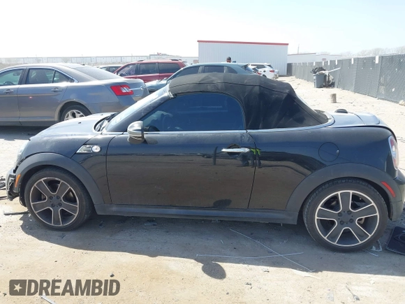 2012 MINI Roadster S with VIN WMWSY3C56CT144520, listed as a IAAI auction lot 41818205 with 86,836 mi miles and . Bid and sale history available at DreamBid. Image 14.