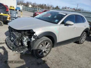 2024 Mazda CX-30 2.5 S Premium Package with VIN 3MVDMBDM7RM674184, listed as a Copart auction lot 87836395 with 11,516 mi miles and Salvage Title. Bid and sale history available at carsss.com. Image 1.