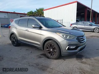 2017 Hyundai Santa Fe Sport 2.0T with VIN 5XYZU4LA0HG487276, listed as a IAAI auction lot 41441697 with 118,248 mi miles. Bid and sale history available at carsss.com. Image 1.