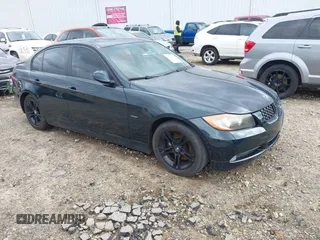 2008 BMW 3 Series 328i with VIN WBAVA37548NL52080, listed as a IAAI auction lot 41682438 with 163,155 mi miles. Bid and sale history available at carsss.com. Image 1.