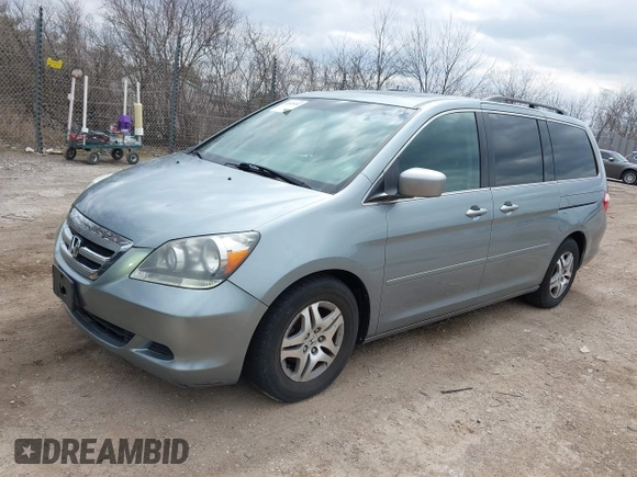 2007 Honda Odyssey EX-L with VIN 5FNRL38717B018097, listed as a IAAI auction lot 42028592 with 141,004 mi miles and . Bid and sale history available at DreamBid. Image 2.