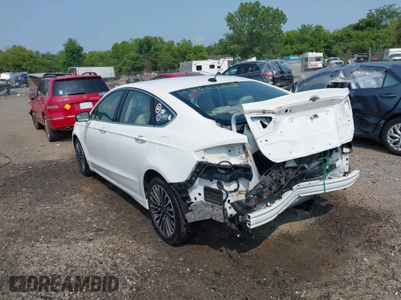 2018 Ford Fusion Titanium with VIN 3FA6P0D97JR247621, listed as a IAAI auction lot 42465608 with 174,983 mi miles and . Bid and sale history available at DreamBid. Image 3.