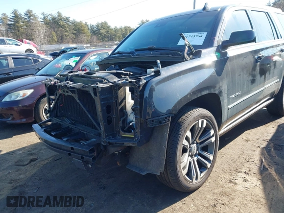 2020 GMC Yukon Denali with VIN 1GKS2CKJXLR204111, listed as a IAAI auction lot 41745764 with 76,364 mi miles. Bid and sale history available at carsss.com. Image 6.