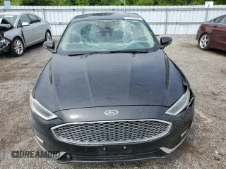 2019 Ford Fusion Titanium z VIN 3FA6P0RU4KR211674, wystawiony jako Copart lot #62205885 z przebiegiem 313 261 mil mil oraz Szkoda całkowita • Salvage title. Historia ofert i sprzedaży dostępna na DreamBid. Obrazek 5.