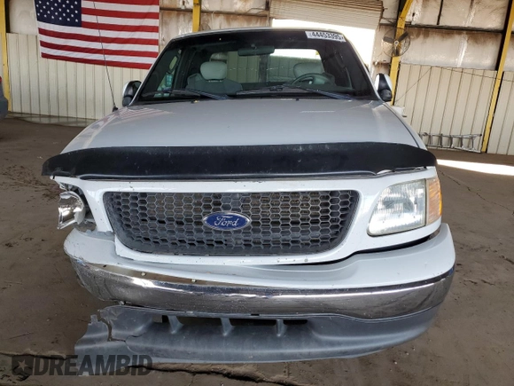 2003 Ford F-150 XL with VIN 1FTRX17L13NB49209, listed as a Copart auction lot 44453395 with 145,262 mi miles and Salvage Title. Bid and sale history available at carsss.com. Image 5.