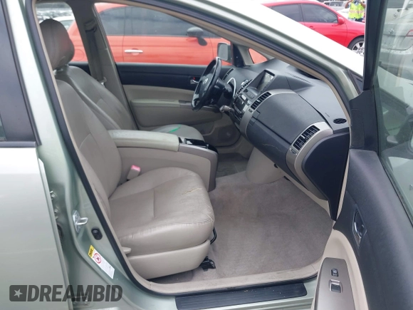 2007 Toyota Prius z VIN JTDKB20U477626959, wystawiony jako IAAI lot #42272184 z przebiegiem 179 443 mil mil oraz . Historia ofert i sprzedaży dostępna na DreamBid. Obrazek 5.