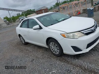 2012 Toyota Camry L z VIN 4T1BF1FK1CU532002, wystawiony jako IAAI lot #42215124 z przebiegiem 209 642 mil mil oraz . Historia ofert i sprzedaży dostępna na DreamBid. Obrazek 1.