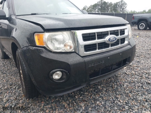 2010 Ford Escape XLT with VIN 1FMCU0DG2AKB66255, listed as a IAAI auction lot 41982329 with 192,564 mi miles. Bid and sale history available at carsss.com. Image 13.