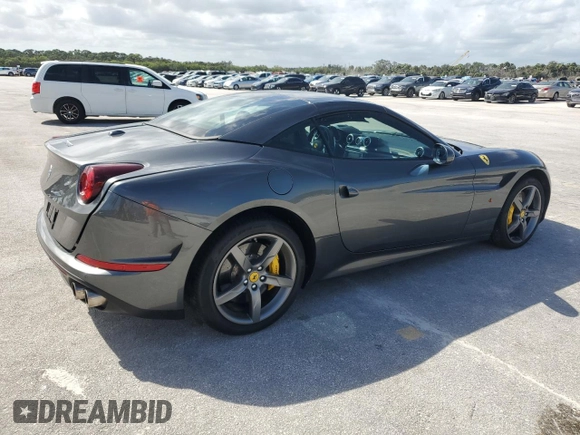 2015 Ferrari California T с VIN ZFF77XJA3F0206563, выставлен на аукционе Copart как лот 73751534 с пробегом Не указан миль и Списание • Salvage title. История ставок и продаж доступна на DreamBid. Изображение 3.