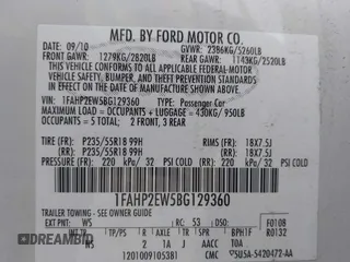 2011 Ford Taurus SEL with VIN 1FAHP2EW5BG129360, listed as a IAAI auction lot 41898961 with 207,440 mi miles. Bid and sale history available at carsss.com. Image 9.