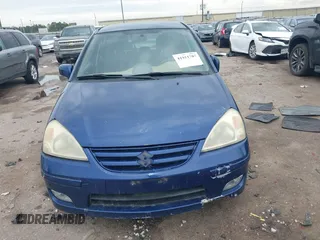 2005 Suzuki Aerio SX with VIN JS2RC61H555303720, listed as a IAAI auction lot 41911707 with 138,286 mi miles and . Bid and sale history available at DreamBid. Image 12.