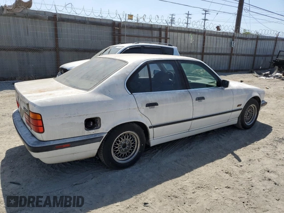 1995 BMW 5 Series 525i z VIN WBAHD6324SGK57242, wystawiony jako Copart lot #57287605 z przebiegiem Nie podano mil oraz Czysty tytuł • Clean title. Historia ofert i sprzedaży dostępna na DreamBid. Obrazek 3.