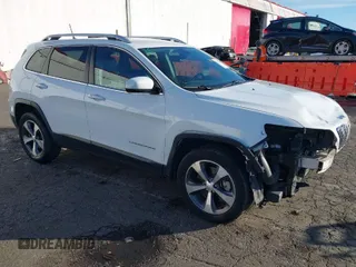 2020 Jeep Cherokee Limited with VIN 1C4PJMDX6LD587585, listed as a IAAI auction lot 41322364 with 104,008 mi miles. Bid and sale history available at carsss.com. Image 1.
