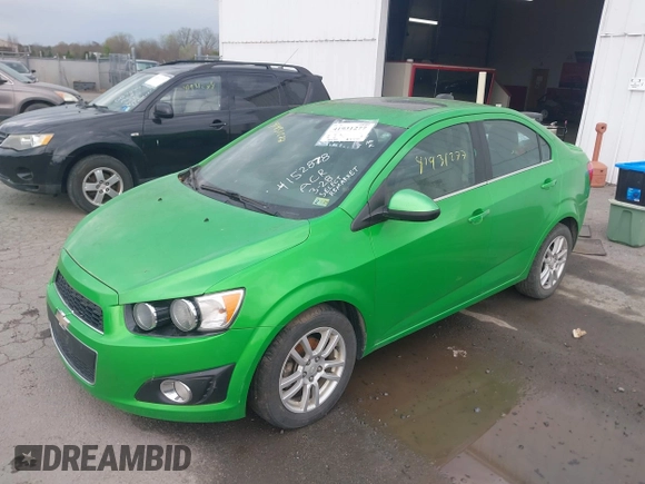 2015 Chevrolet Sonic LT with VIN 1G1JC5SH7F4152878, listed as a IAAI auction lot 41931277 with 180,189 mi miles and . Bid and sale history available at DreamBid. Image 2.