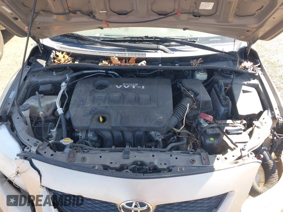 2009 Toyota Corolla with VIN 1NXBU40E09Z144942, listed as a IAAI auction lot 42051178 with 101,564 mi miles and . Bid and sale history available at DreamBid. Image 10.