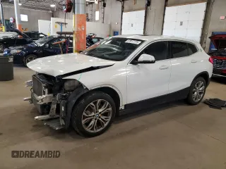 2022 BMW X2 xDrive28i z VIN WBXYJ1C05N5U18648, wystawiony jako Copart lot #57917775 z przebiegiem 63 991 mil mil oraz Szkoda całkowita • Salvage title. Historia ofert i sprzedaży dostępna na DreamBid. Obrazek 1.
