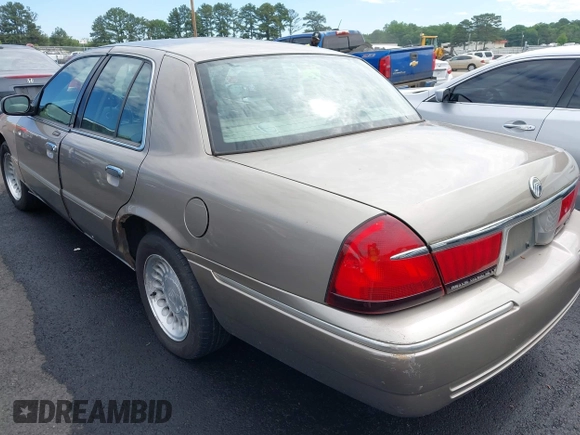 2001 Mercury Grand Marquis LS z VIN 2MEFM75W11X610723, wystawiony jako IAAI lot #42208567 z przebiegiem 190 397 mil mil oraz . Historia ofert i sprzedaży dostępna na DreamBid. Obrazek 3.