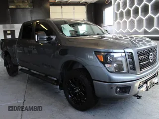 2018 Nissan Titan Platinum Reserve with VIN 1N6BA1F46JN524633, listed as a Copart auction lot 64500155 with 94,747 mi miles and Salvage title. Bid and sale history available at DreamBid. Image 1.