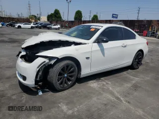 2007 BMW 3 Series 328i with VIN WBAWB33527P131183, listed as a Copart auction lot 62190105 with 173,341 mi miles and Salvage title. Bid and sale history available at DreamBid. Image 1.