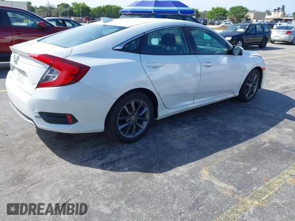 2021 Honda Civic Sedan EX with VIN 2HGFC1F37MH700657, listed as a IAAI auction lot 41633417 with 87,379 mi miles. Bid and sale history available at carsss.com. Image 4.