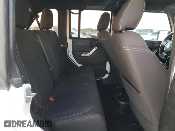 2017 Jeep Wrangler Unlimited Sahara with VIN 1C4BJWEG4HL701813, listed as a Copart auction lot 84496424 with 49,858 mi miles and Salvage title. Bid and sale history available at DreamBid. Image 11.