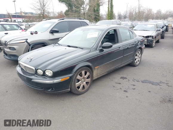 2006 Jaguar X-Type with VIN SAJWA51A16WE68650, listed as a IAAI auction lot 41461291 with 135,332 mi miles and . Bid and sale history available at DreamBid. Image 2.