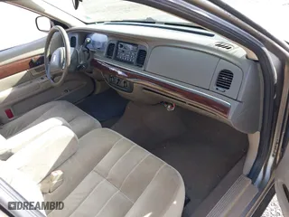 2003 Mercury Grand Marquis GS Convenience with VIN 2MEFM74W43X681774, listed as a IAAI auction lot 42057422 with 218,422 mi miles. Bid and sale history available at carsss.com. Image 5.