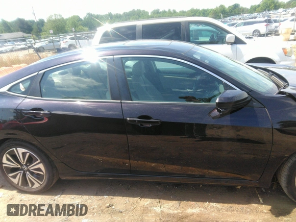 2016 Honda Civic EX-L z VIN 19XFC1F74GE041373, wystawiony jako IAAI lot #42201565 z przebiegiem 122 069 mil mil oraz . Historia ofert i sprzedaży dostępna na DreamBid. Obrazek 13.