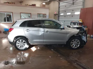 2015 Mitsubishi Outlander Sport ES with VIN 4A4AR3AU3FE039943, listed as a IAAI auction lot 41626095 with 142,610 mi miles. Bid and sale history available at carsss.com. Image 13.