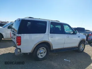 1999 Ford Expedition XLT z VIN 1FMPU18L2XLB77547, wystawiony jako IAAI lot #41161721 z przebiegiem 205 649 mil mil oraz . Historia ofert i sprzedaży dostępna na DreamBid. Obrazek 13.
