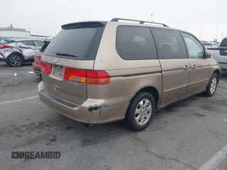 2003 Honda Odyssey EX with VIN 5FNRL186X3B074397, listed as a IAAI auction lot 41164455 with 275,188 mi miles and . Bid and sale history available at DreamBid. Image 4.