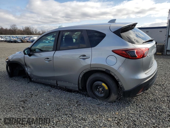 2014 Mazda CX-5 Touring with VIN JM3KE4CY4E0427294, listed as a Copart auction lot 51372155 with 121,324 mi miles and Salvage Title. Bid and sale history available at carsss.com. Image 2.