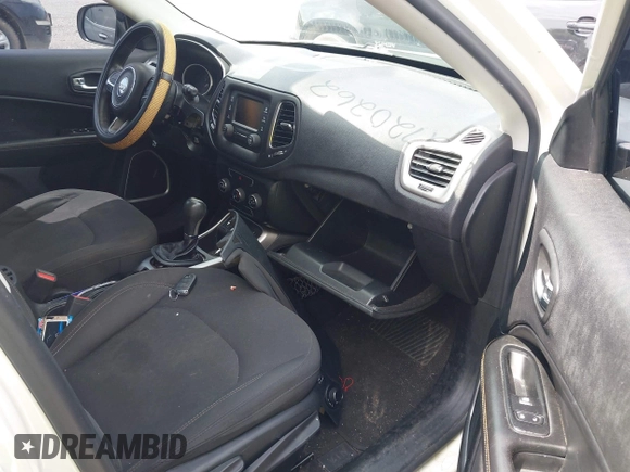 2018 Jeep Compass Sport with VIN 3C4NJCAB0JT124679, listed as a IAAI auction lot 42720262 with 119,267 mi miles and . Bid and sale history available at DreamBid. Image 5.