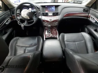 2015 Infiniti Q70 with VIN JN1BY1APXFM540740, listed as a Copart auction lot 55479495 with 140,344 mi miles and Salvage title. Bid and sale history available at DreamBid. Image 8.