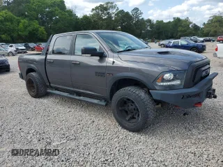 2017 Ram 1500 Rebel with VIN 1C6RR7YT2HS612311, listed as a Copart auction lot 55109725 with 142,796 mi miles and Salvage title. Bid and sale history available at DreamBid. Image 4.