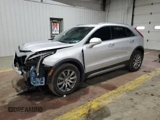2020 Cadillac XT4 AWD Premium Luxury with VIN 1GYFZDR40LF055380, listed as a Copart auction lot 43933755 with 54,646 mi miles and Salvage Title. Bid and sale history available at carsss.com. Image 1.