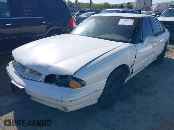 1999 Pontiac Bonneville SE z VIN 1G2HX52KXXH254051, wystawiony jako IAAI lot #41990245 z przebiegiem 213 000 mil mil oraz . Historia ofert i sprzedaży dostępna na DreamBid. Obrazek 2.