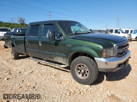 2000 Ford F-350 XL with VIN 1FTSW31F7YEE20820, listed as a Copart auction lot 77496284 with 312,193 mi miles and Salvage Title. Bid and sale history available at DreamBid. Image 4.