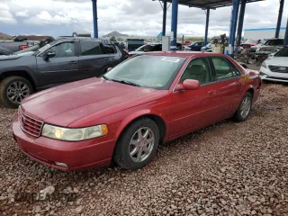 2003 Cadillac Seville Luxury SLS z VIN 1G6KS54Y23U203844, wystawiony jako Copart lot #48009925 z przebiegiem 89 162 mil mil oraz Szkody całkowita. Historia ofert i sprzedaży dostępna na DreamBid. Obrazek 1.