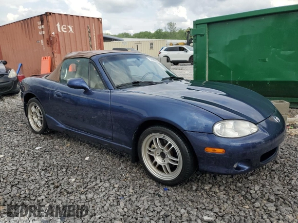 2003 Mazda MX-5 Miata Cloth with VIN JM1NB353230312023, listed as a Copart auction lot 53968875 with 174,252 mi miles and Salvage title. Bid and sale history available at DreamBid. Image 4.
