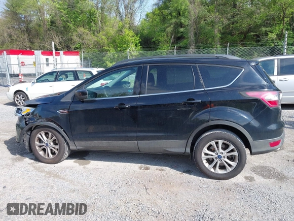 2017 Ford Escape SE with VIN 1FMCU9G91HUB56073, listed as a IAAI auction lot 42130463 with 94,275 mi miles and . Bid and sale history available at carsss.com. Image 14.